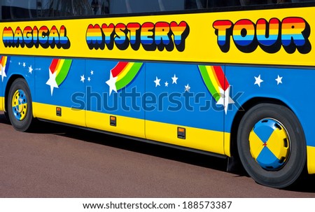 LIVERPOOL, UK - APRIL 15TH 2014: A Magical Mystery Tour bus in Liverpool used to take tourists around to see all of \'The Beatles\' landmarks on 15th April 2014.