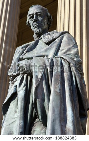 LIVERPOOL, UK - APRIL 15TH 2014: Statue of former British Prime Minister Benjamin Disraeli outside St. George\'s Hall in Liverpool on 15th April 2014.