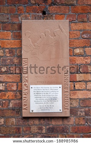 LIVERPOOL, UK - APRIL 16TH 2014: A plaque on St. Peters church hall recalling the first meeting of John Lennon and Paul McCartney (the founding members of The Beatles) in Liverpool on 16th April 2014.