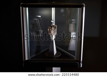 LONDON, UK - OCTOBER 22ND 2014: A fragment of Moon rock on display in the Science Museum in London on 22nd October 2014.