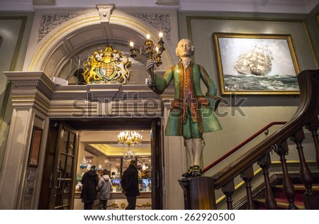LONDON, UK - MARCH 22ND 2015: The grand entrance to the Fortnum and Mason store on Piccadilly in London on 22nd March 2015.