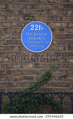 LONDON, UK - JULY 10TH 2015: The blue plaque above 221b Baker Street, the home of ficitional character Sherlock Holmes in London, on 10th July 2015.