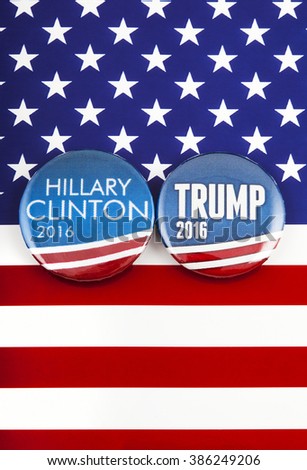 LONDON, UK - MARCH 3RD 2016: Hillary Clinton and Donald Trump pin badges over the American flag, symbolizing their battle to become the next President of the United States, 3rd March 2016.