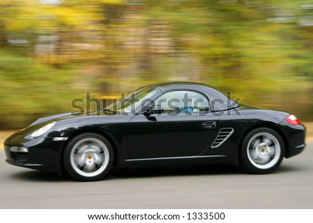 Photo of expensive car, fast moving