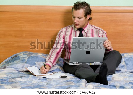 A young man in the hotel working