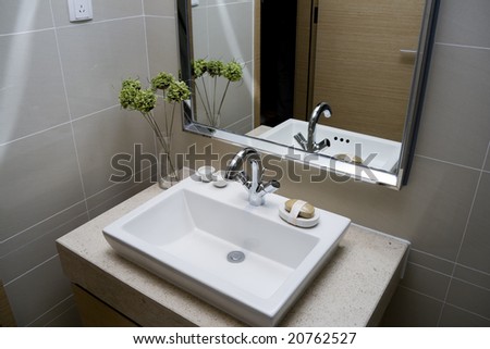 modern bathroom with sinks and mirror