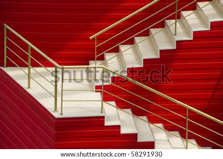 The red wall has rises the stairs