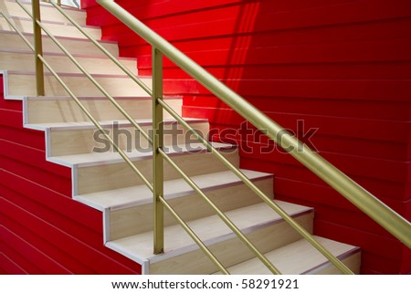 The red wall has rises the stairs