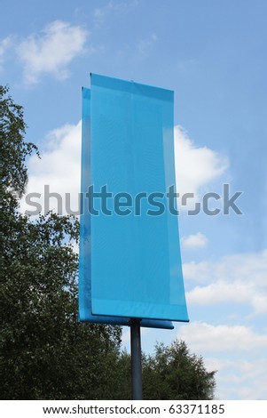 simple blue blank banner with blue sky background and trees