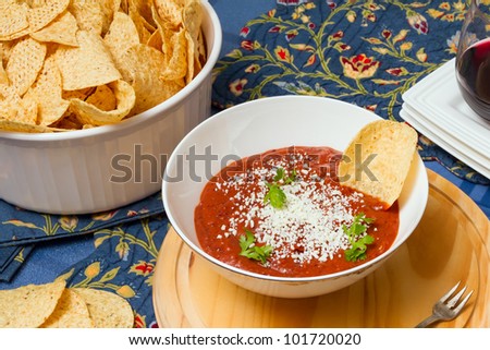 Mexican party with corn chips and bean deep