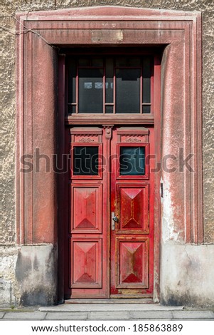 Old fashioned front door entrance, all in dark brown colors, Europe
