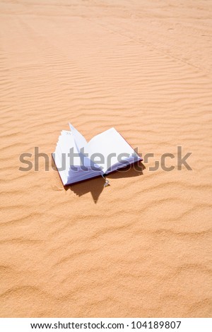 note book on sand dune of Wadi Rum desert, Jordan
