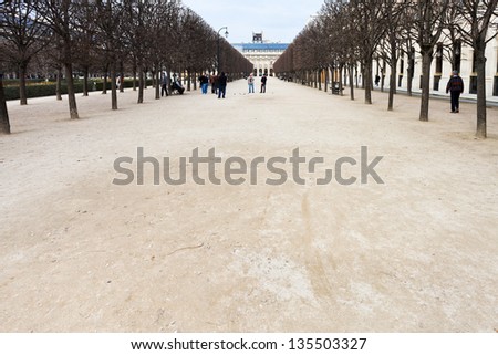 PARIS, FRANCE - MARCH 5: Petanque players in Palais-Royal gardens. The current form of the game originated in 1907 in La Ciotat, in Provence, in southern France, in Paris, France on March 5, 2013