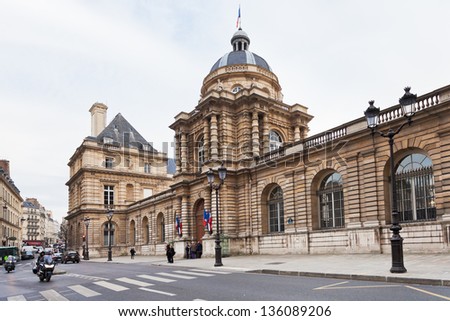 PARIS, FRANCE - MARCH 6: Luxembourg Palace - Senate - from Rue de vaugirard in Paris on March 6, 2013. Rue de Vaugirard is the longest road in Paris, at 4.3 km