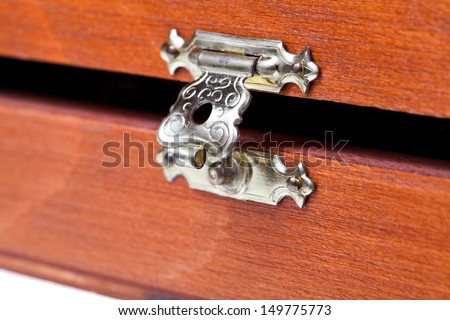 open metal lock of wooden case close up