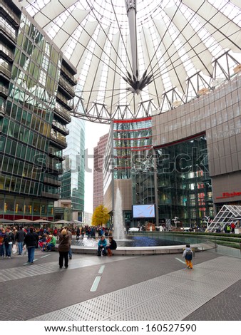 BERLIN, GERMANY - OCTOBER 15: tourists in Sony Center on Potsdamer Platz in Berlin, Gemany on October 15, 2013. Sony Center is a Sony-sponsored building complex located at the Potsdamer Platz.