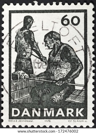 DENMARK - CIRCA 1976: A postage stamp printed in the Denmark shows workers and glass Blowing - glass production at Holmegaard Glassworks, circa 1976