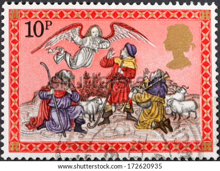 UNITED KINGDOM - CIRCA 1979: A postage stamp printed in the United Kingdom shows Christmas scenery Angel appearing before the shepherds, Christmas, circa 1979