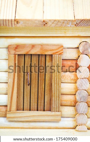 door of model of simple village wooden log house isolated on white background