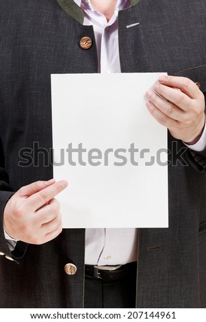 coach holds blank sheet of paper in hands isolated on white background