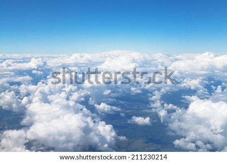 above view of white clouds in blue sky and lands under clouds