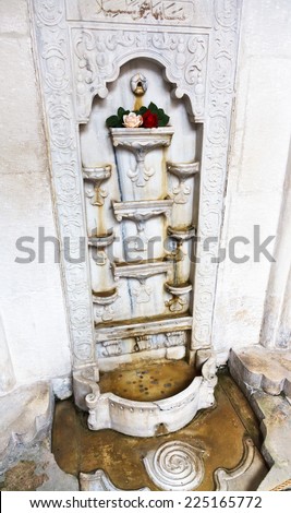 BAKHCHYSARAI, RUSSIA - OCTOBER 1, 2014: marble Fountain of Tears in Bakhchisaray Khan\'s Palace (Hansaray). The palace was built in 16th cent. and became home for Crimean Tatar Khans