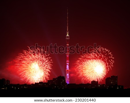 red fireworks near Ostankino TV Tower in Moscow in night