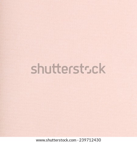 square background from peach color pastel paper close up