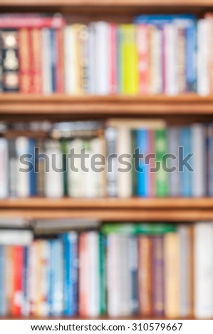 blurred background from book shelves with many books