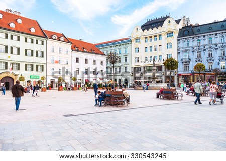 BRATISLAVA, SLOVAKIA - SEPTEMBER 22, 2015: People at Main Square (Hlavne namestie) in Bratislava Old Town. The square is located in the Old Town and it is the center of the city.