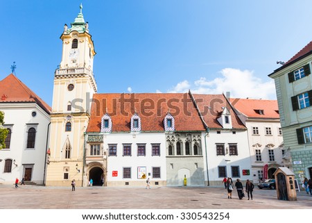 BRATISLAVA, SLOVAKIA - SEPTEMBER 23, 2015: People near old Town Hall at Main Square (Hlavne namestie) in Bratislava city. The square is located in the Old Town and it is the center of the city.