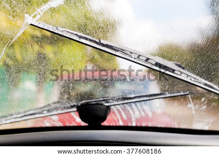 Car wipers clean windshield when driving in bad weather