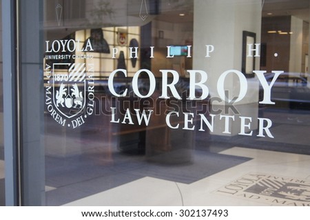 Chicago, Illinois - July 31, 2015 - Window sign for the Philip E. Corboy Law Center at the Loyola University Chicago School of Law