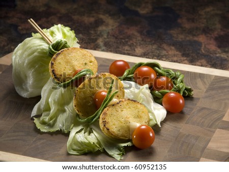 Grilled Barbecue fish cake with tomato