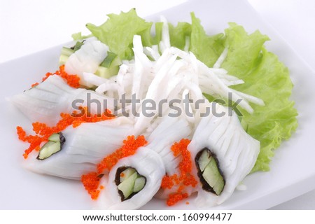 Land with vegetables and greens on a white background close up