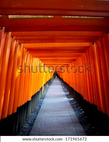 Red Tori Gate At Fushimi Inari Shrine In Kyoto, Japan