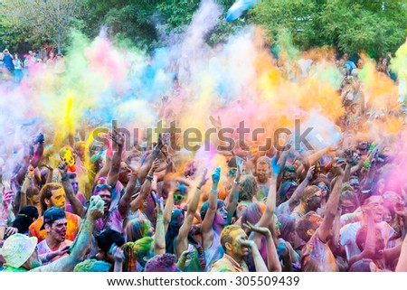 MADRID SPAIN -AUG 8: People celebrated Monsoon Holi Festival of Colors on August 8, 2015 in Madrid, Spain. People dancing and celebrating during the color throw.