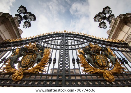 LONDON - NOV 5: Gate of Buckingham palace on November 5, 2011 in  London U.K. Buckingham palace is the official residence of Queen Elizabeth II and one of the major tourist destinations U.K.