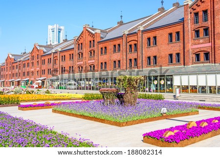 YOKOHAMA, JAPAN - APRIL 12: An old brick warehouse with flower garden in Red brick park, Yokohama, Japan on APRIL 12, 2014.