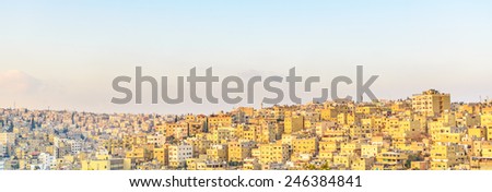 Panoramic view of Amman City at early-evening viewed from Citadel Hill in Amman, Jordan.