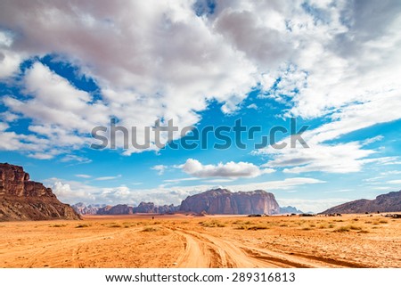 Jordanian desert in Wadi Rum, Jordan. Wadi Rum is known as The Valley of the Moon and has led to its designation as a UNESCO World Heritage Site.
