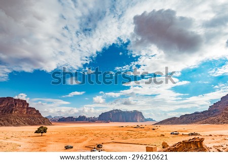 Jordanian desert in Wadi Rum, Jordan. Wadi Rum has led to its designation as a UNESCO World Heritage Site and is known as The Valley of the Moon.