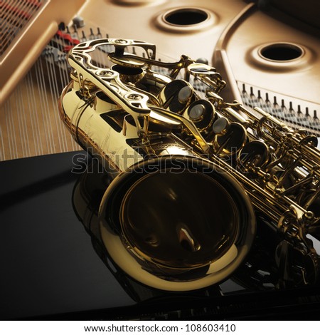 Alto saxophone on grand piano Alto saxophone on grand piano