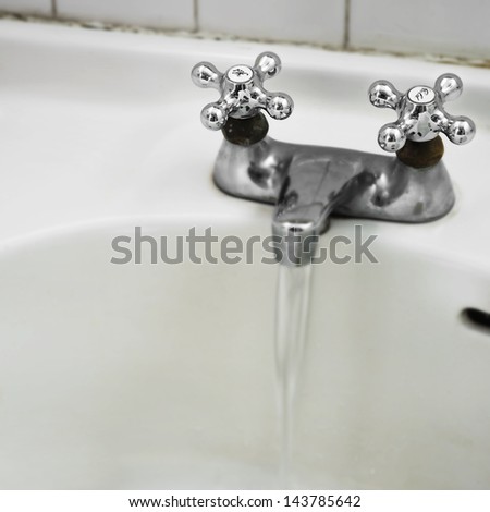 water tap flowing water