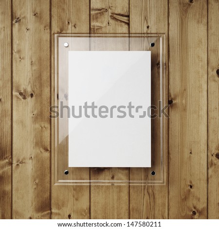 glass frame on wooden wall