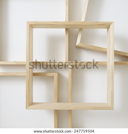 empty wood shelf on white wall