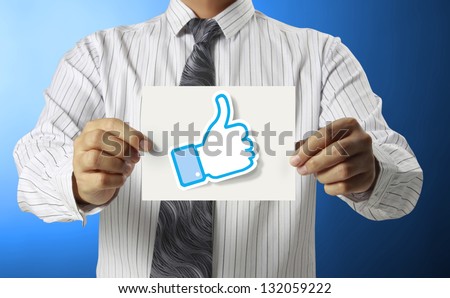 Business man handing social network business card over