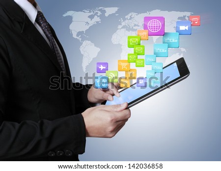 touch screen ,touch- tablet in hands Business man