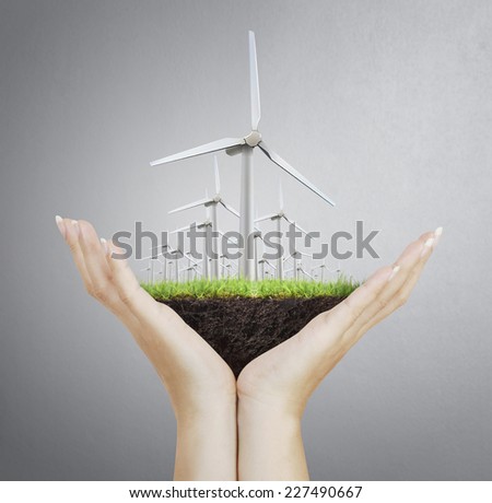 Eco power, wind turbines  in the hand