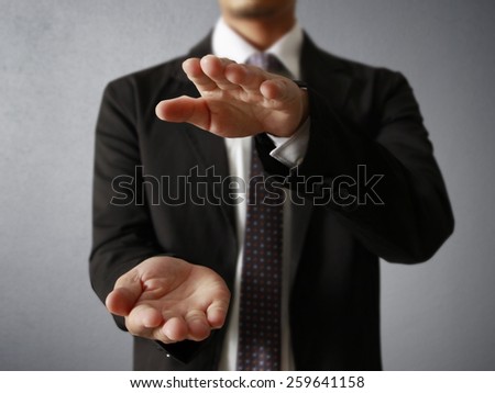Open palm hand gesture of male hand